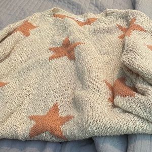 Star and cream pattern sweater